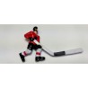 Red player with long stick